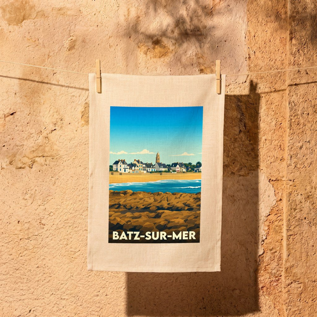 Torchon souvenir de la ville de Batz-sur-Mer avec une illustration stylisée du bord de mer.