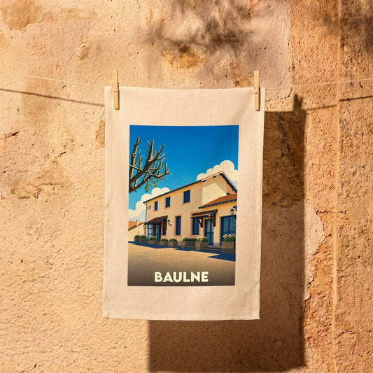 Torchon souvenir de la ville de Baulne avec une illustration stylisée d'une maison ensoleillée.