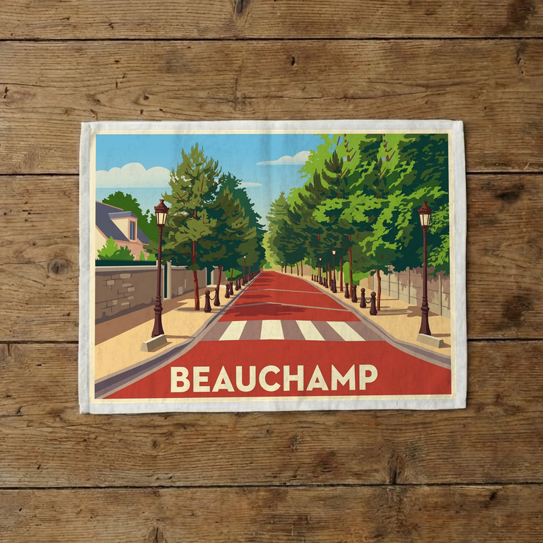 Torchon souvenir de la ville de Beauchamp avec une illustration stylisée d'une rue bordée d'arbres.