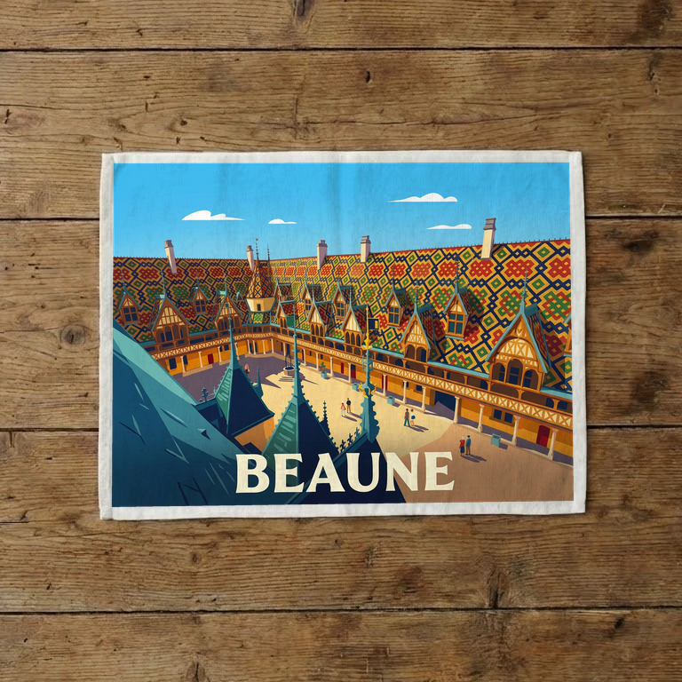 Torchon souvenir de la ville de Beaune avec une illustration stylisée de ses célèbres toits colorés.