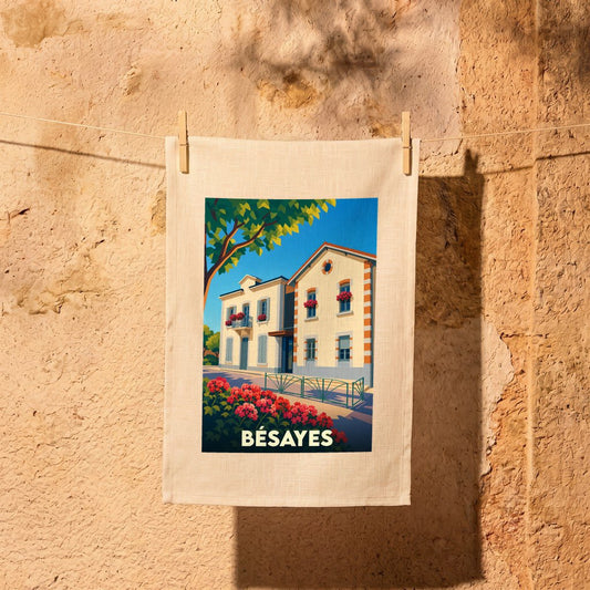 Torchon souvenir de la ville de Bésayes avec une illustration stylisée d'une maison de village.