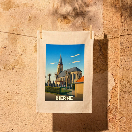 Torchon souvenir de la ville de Bierne avec une illustration stylisée de son église.