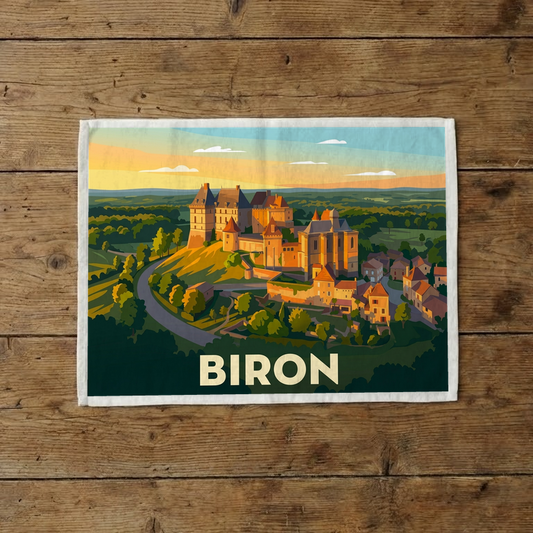 Torchon souvenir de la ville de Biron avec une illustration stylisée.
