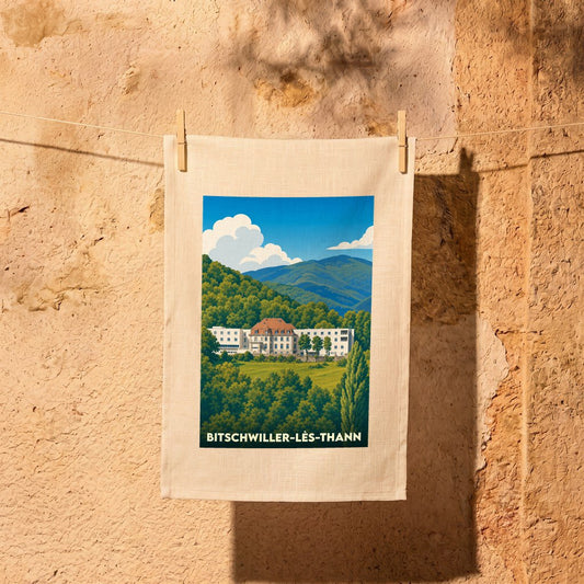 Torchon souvenir de la ville de Bitschwiller-lès-Thann avec une illustration stylisée.