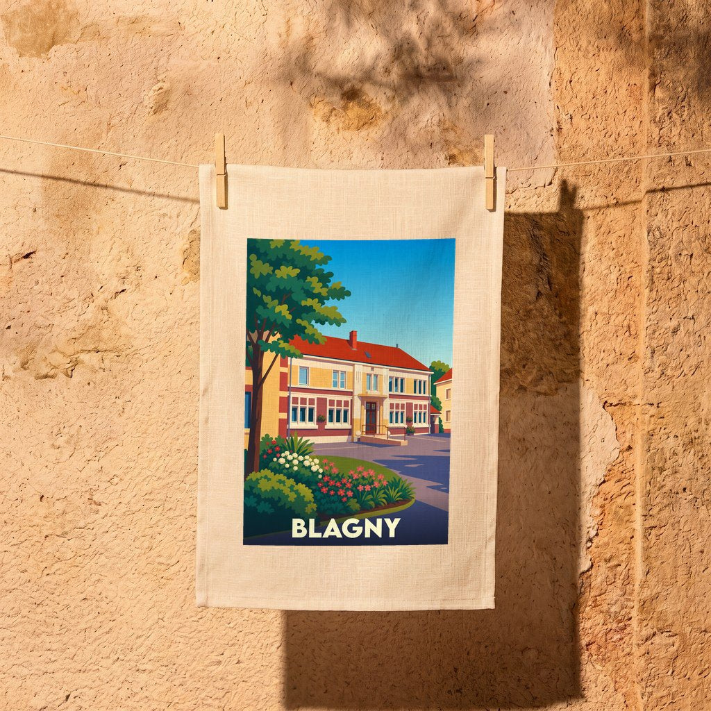Torchon souvenir de la ville de Blagny avec une illustration stylisée d'un bâtiment emblématique.