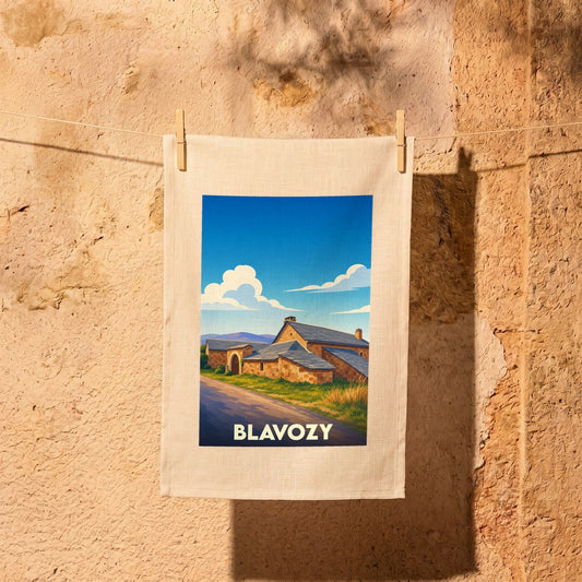 Torchon souvenir de la ville de Blavozy illustré d'un paysage provençal stylisé.
