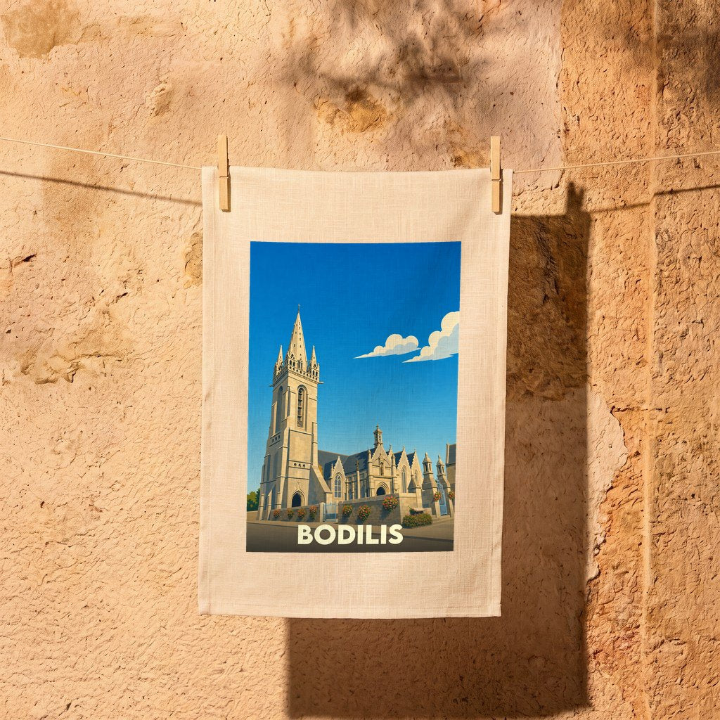 Torchon souvenir de la ville de Bodilis illustrant son église dans un style vintage.