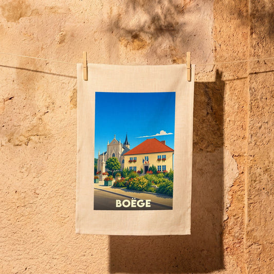Torchon souvenir de la ville de Boëge avec une illustration stylisée.