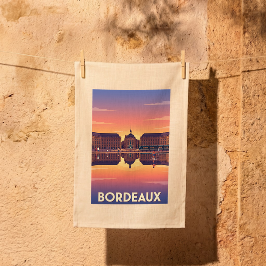 Torchon souvenir de la ville de Bordeaux avec une illustration stylisée de la Place de la Bourse.