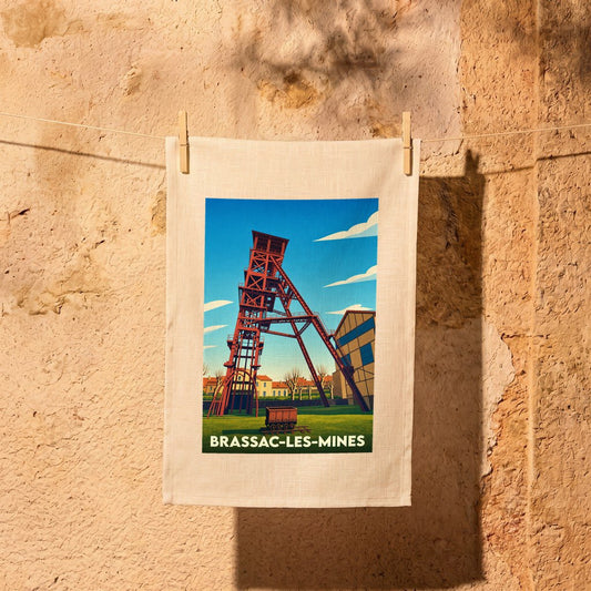 Torchon souvenir de la ville de Brassac-les-Mines avec une illustration stylisée d'un chevalement de mine.