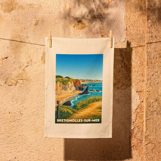 Torchon de cuisine en lin blanc avec une illustration de bord de mer rétro de la ville de Bretignolles-sur-Mer.