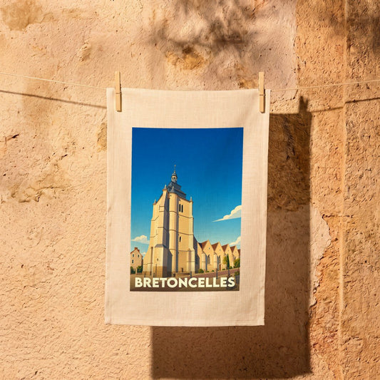 Torchon souvenir de la ville de Bretoncelles avec une illustration stylisée de son église.