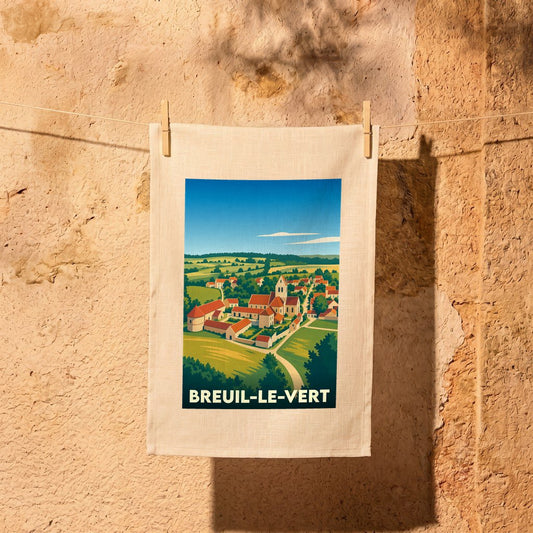 Torchon souvenir de la ville de Breuil-le-Vert avec une illustration paysagère stylisée.