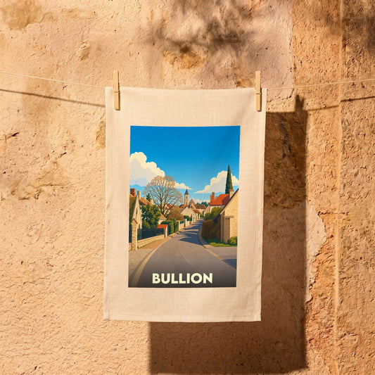 Torchon souvenir de la ville de Bullion illustré d'un paysage urbain stylisé.