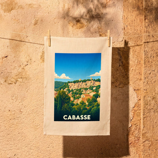 Torchon souvenir de la ville de Cabasse avec une illustration stylisée.