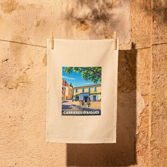 Torchon souvenir de la ville de Cabrières-d'Aigues avec une illustration stylisée.