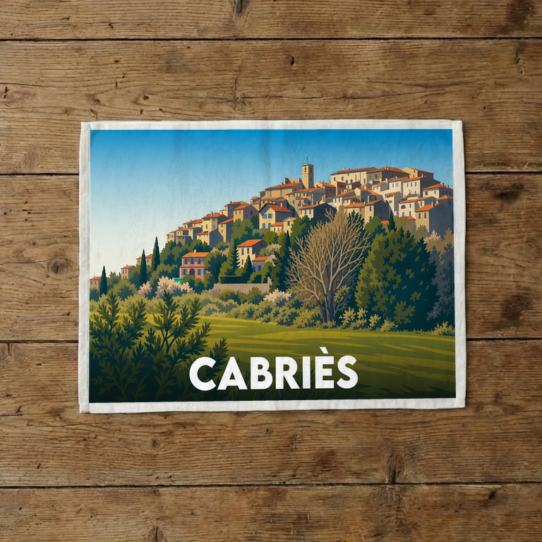 Torchon souvenir de la ville de Cabriès illustré par une vue stylisée du village perché.