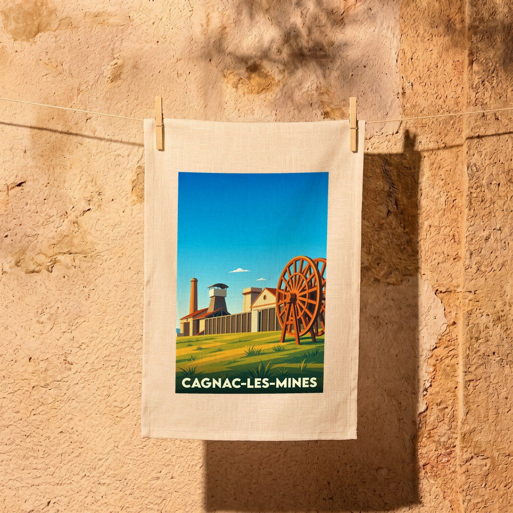 Torchon souvenir de la ville de Cagnac-les-Mines avec une illustration stylisée de son patrimoine minier.