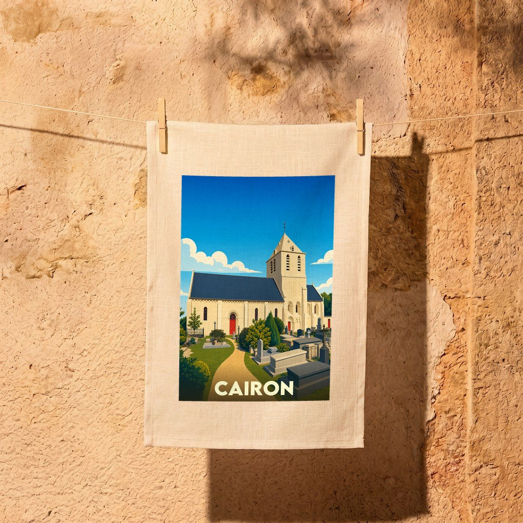 Torchon souvenir de la ville de Cairon illustré d'une église stylisée et de son cimetière.