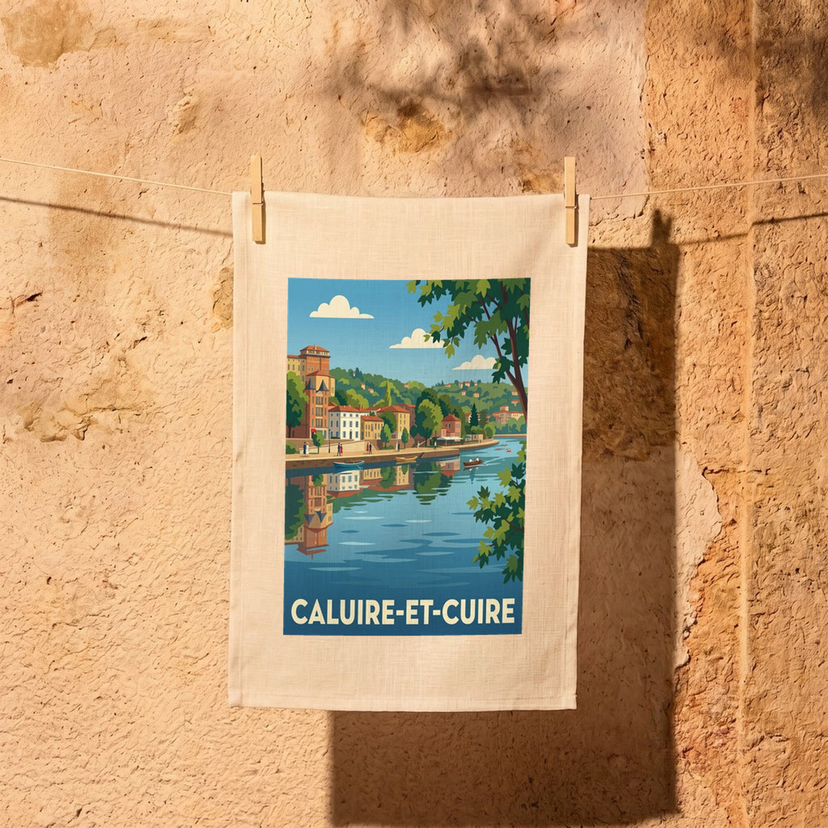 Torchon souvenir de la ville de Caluire-et-Cuire avec une illustration stylisée.