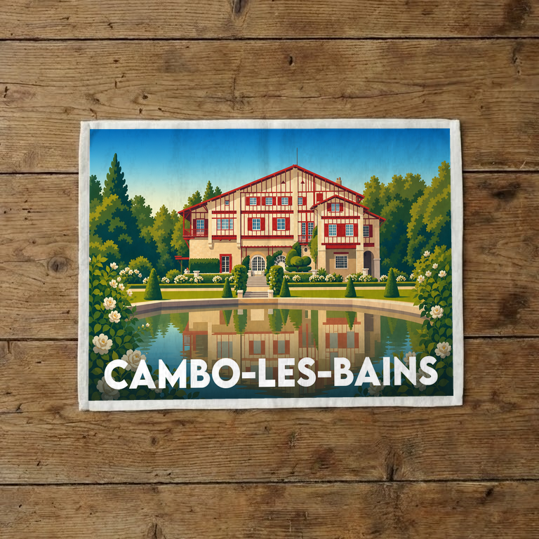 Torchon souvenir de la ville de Cambo-les-Bains orné d'une illustration stylisée de la Villa Arnaga et son jardin.