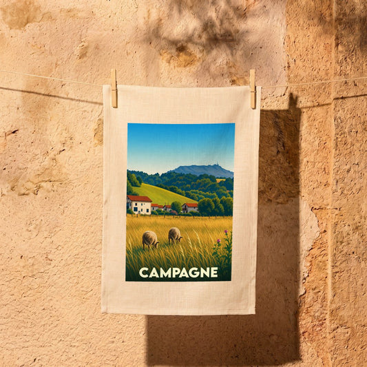 Torchon souvenir de la ville de Campagne avec une illustration stylisée d'un paysage rural.