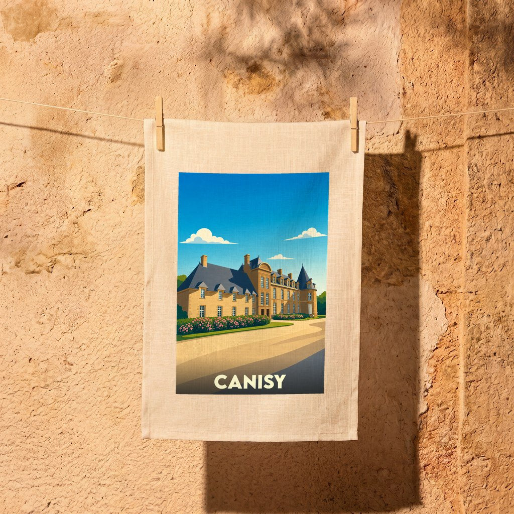 Torchon souvenir de la ville de Canisy avec une illustration stylisée de son château.