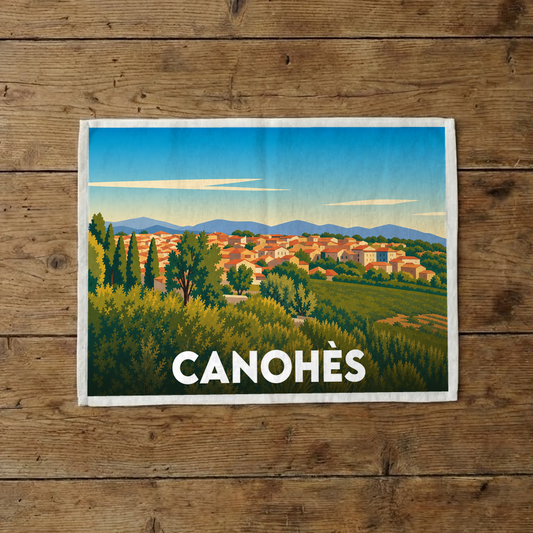 Torchon souvenir de la ville de Canohès avec une illustration stylisée.