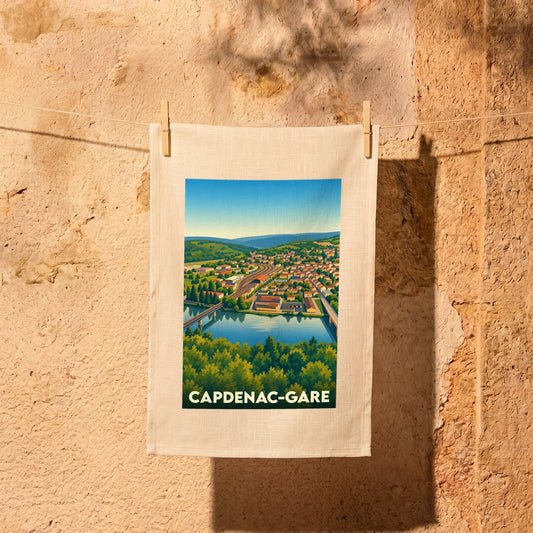 Torchon souvenir de la ville de Capdenac-Gare avec une illustration stylisée.