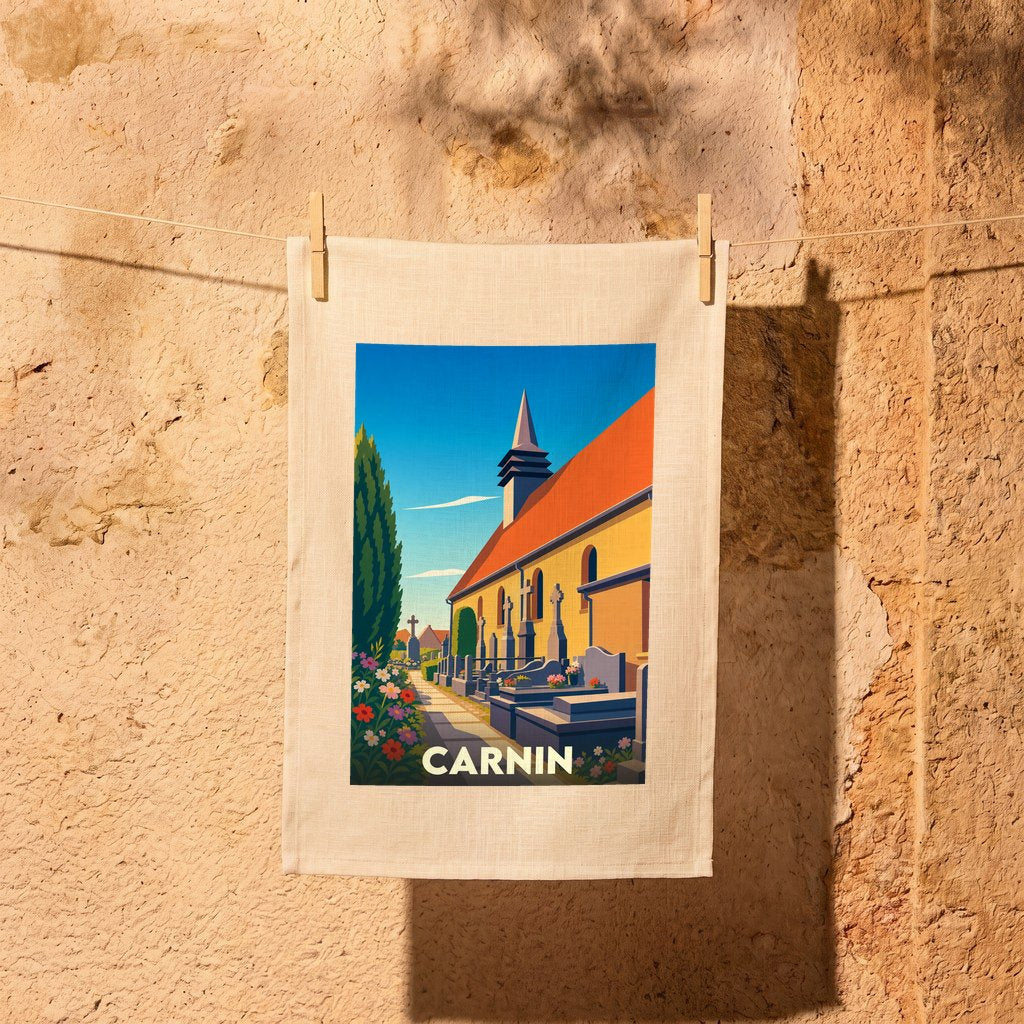 Torchon souvenir de la ville de Carnin avec une illustration stylisée de son église et de son cimetière.