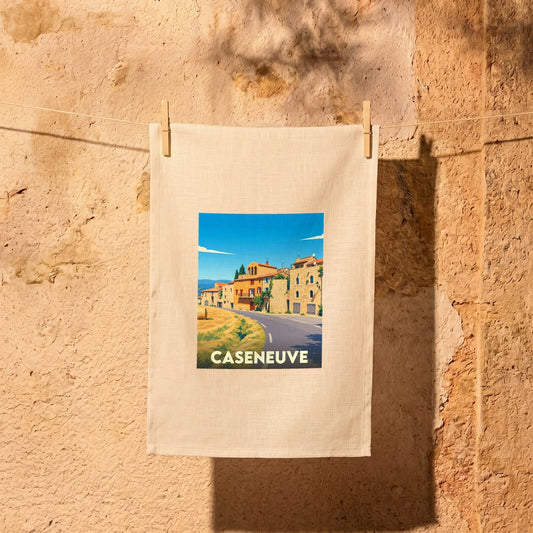 Torchon souvenir de la ville de Caseneuve orné d'une illustration stylisée de ses maisons provençales.