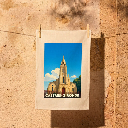 Torchon souvenir de la ville de Castres-Gironde illustré d'une église sous un ciel bleu.