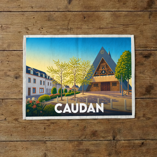 Torchon souvenir de la ville de Caudan avec une illustration stylisée de son église moderne et du centre-ville.