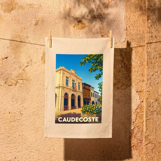 Torchon souvenir de la ville de Caudecoste avec une illustration stylisée.
