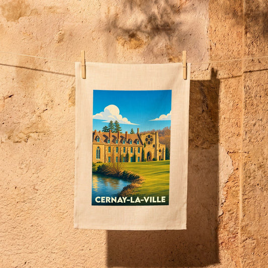 Torchon souvenir de la ville de Cernay-la-Ville avec une illustration stylisée de son abbaye.