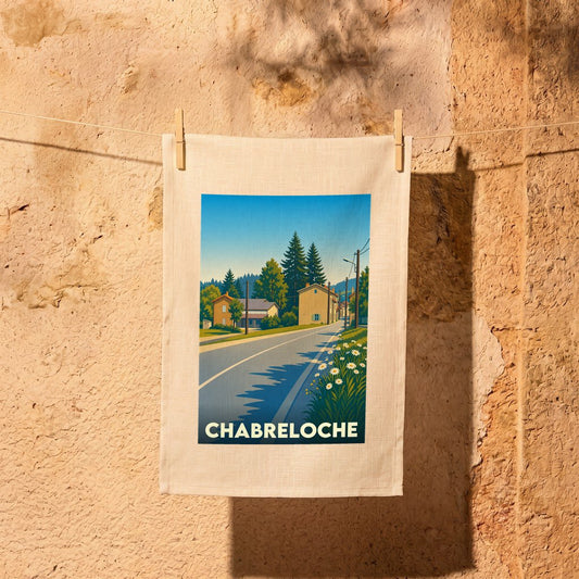 Torchon souvenir de la ville de Chabreloche illustré d'un paysage urbain au style vintage.