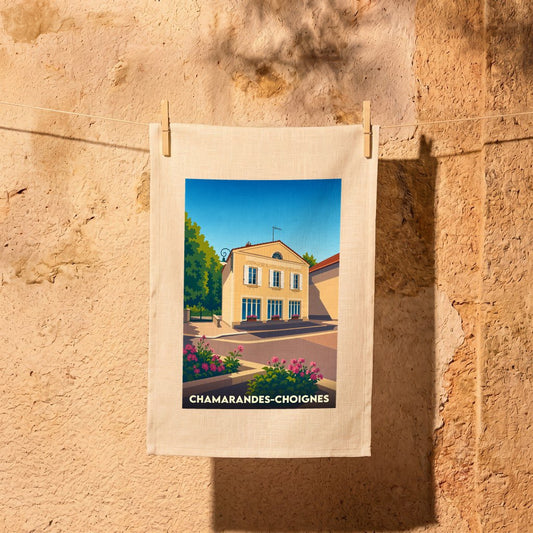 Torchon souvenir de la ville de Chamarandes-Choignes avec une illustration stylisée d'une maison ensoleillée.