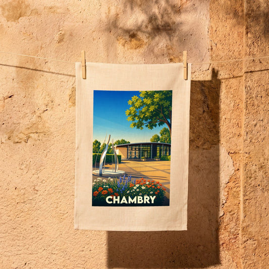 Torchon souvenir de la ville de Chambry avec une illustration stylisée.