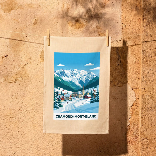Torchon souvenir de Chamonix-Mont-Blanc illustrant un paysage de montagne enneigé avec son village.