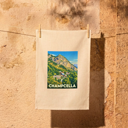 Torchon souvenir de la ville de Champcella avec une illustration de paysage de montagne stylisée.