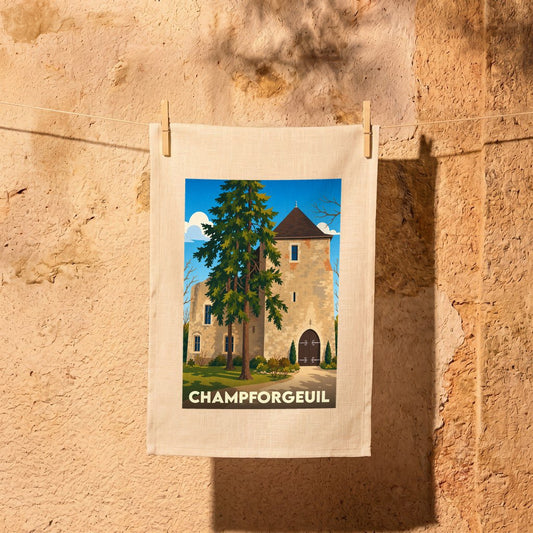 Torchon souvenir de la ville de Champforgeuil illustrant un château et des sapins dans un style vintage.