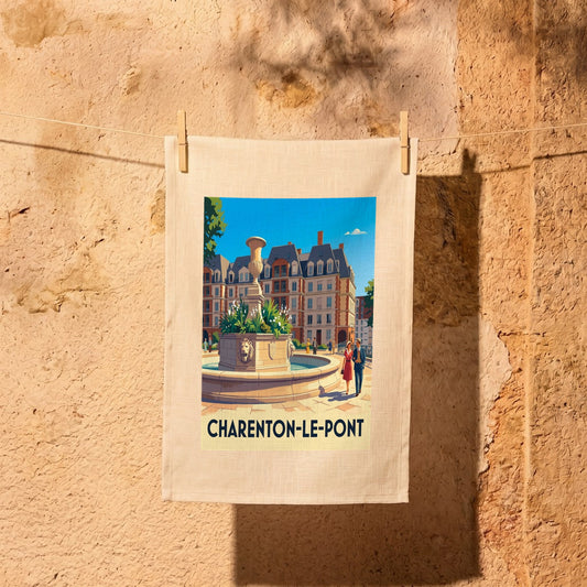 Torchon souvenir de la ville de Charenton-le-Pont avec une illustration stylisée d'une fontaine et de bâtiments.
