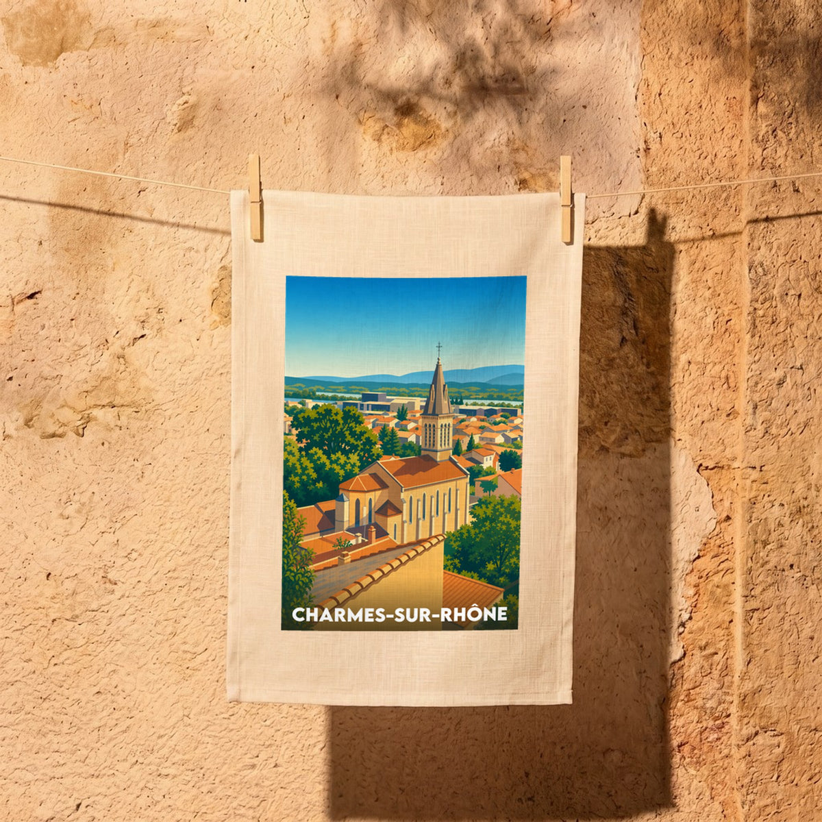 Torchon souvenir de la ville de Charmes-sur-Rhône avec une illustration stylisée.