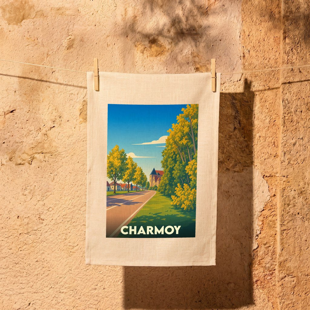 Torchon souvenir de la ville de Charmoy avec une illustration stylisée et colorée.
