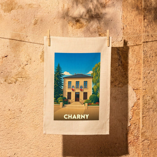 Torchon souvenir de la ville de Charny avec une illustration stylisée d'un bâtiment officiel.