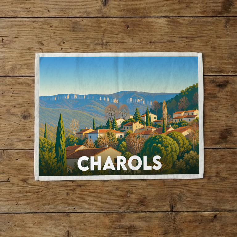 Torchon souvenir de la ville de Charols avec une illustration stylisée de son paysage.