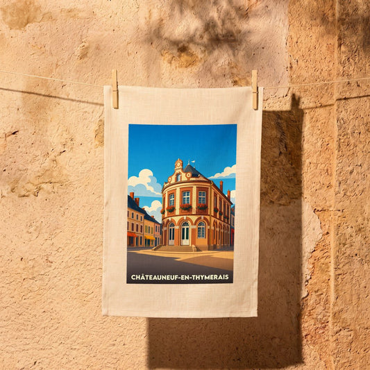 Torchon souvenir de la ville de Châteauneuf-en-Thymerais avec une illustration stylisée.