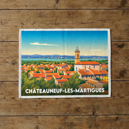 Torchon souvenir de la ville de Châteauneuf-les-Martigues avec une illustration stylisée de son paysage.