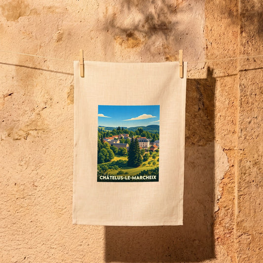 Torchon souvenir de la ville de Châtelus-le-Marcheix avec une illustration paysagère stylisée.