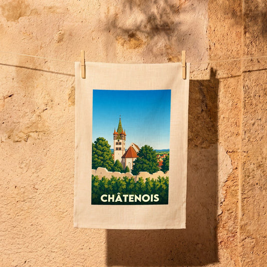 Torchon souvenir de la ville de Châtenois avec une illustration stylisée d'une église et de vignobles.